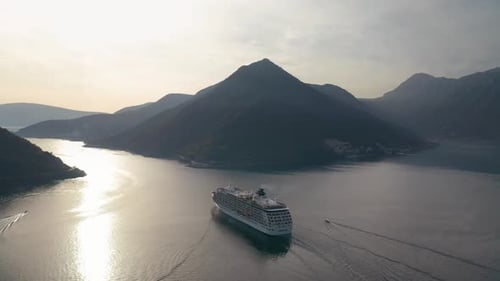 Large cruise ship passing through the picturesque bay of Kotor in Montenegro