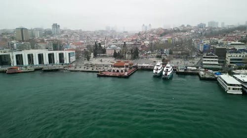 Besiktas Pier ferry terminal fly backwards shot