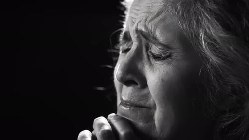 Monochrome Portrait of Elderly Woman Weeping