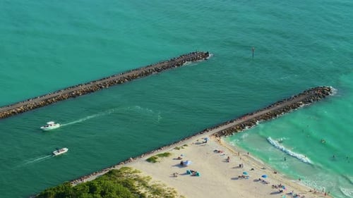 Venice South Jetty and Nokomis North Jetty with Recreational Motorboats and Yachts Sailing at Inlet