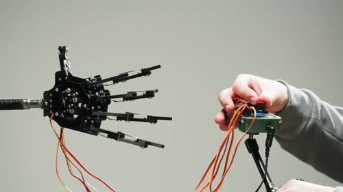 Robotic Arm Controlled by Hand Device