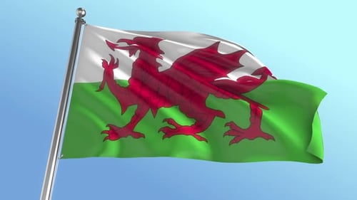 Realistic Waving Flag of Wales on Flagpole