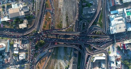 Aerial Top Down View of Complex Urban Highway Interchange Traffic