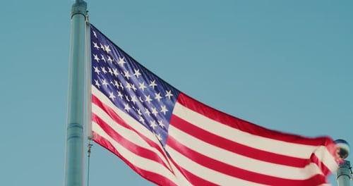 American Flag Waving Proudly in the Wind
