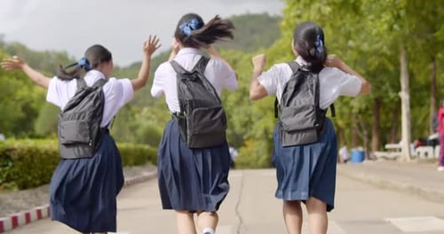 A group of Asian high school student girls in white uniform going back to school