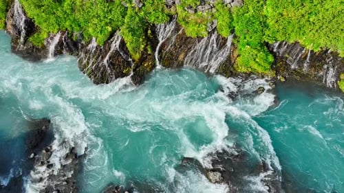 Summer Waterfall Many Small Streams Flow From the Lava Field River with the Purest Glacial Water of