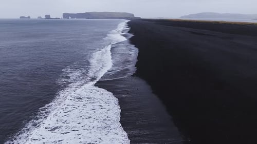 Aerial View of Reynisfjara Black Sand Beach and Dyrholaey Arch Iceland