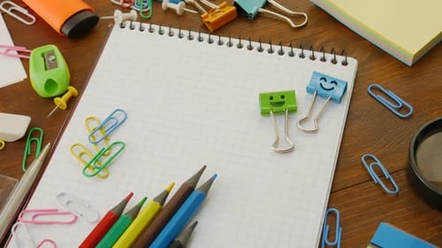 Desk View with Stationery, Notebook, and Supplies