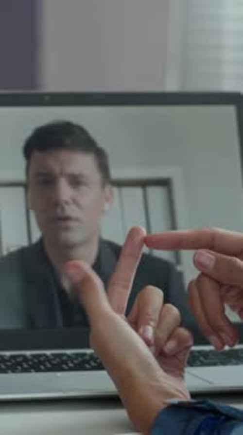 Virtual Meeting on Laptop with Hand Gestures