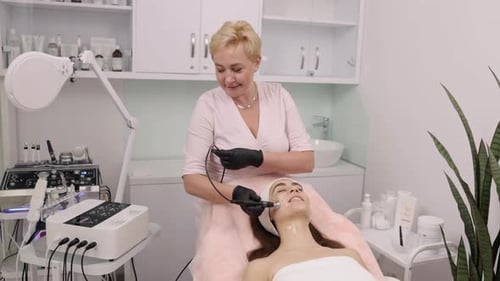 Woman Getting Professional Facial Treatment in Medical Spa