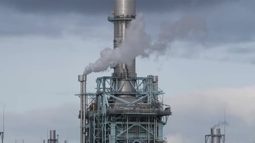 Smoke pollution out of industrial factory chimney