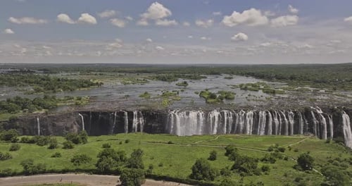 Victoria Falls Zimbabwe Aerial v8 flyover cliffside capturing the spectacular landscape of the