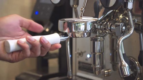 Preparing Espresso with Industrial Chrome Espresso Machine