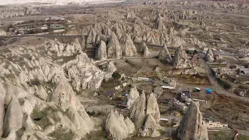 Aerial video of a panoramic view of natural rock formations in Cappadocia, Turkey