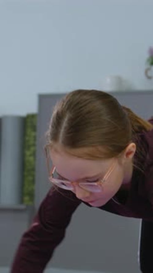 Girl in Gym Doing Plank Exercise for Fitness