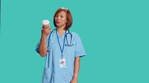 Nurse Enjoying Cup of Coffee