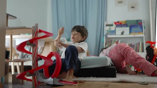 Children playing with toys in a bright playroom