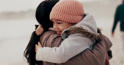 Beach, hug and mother with girl, happiness and ocean with vacation or travel with getaway trip