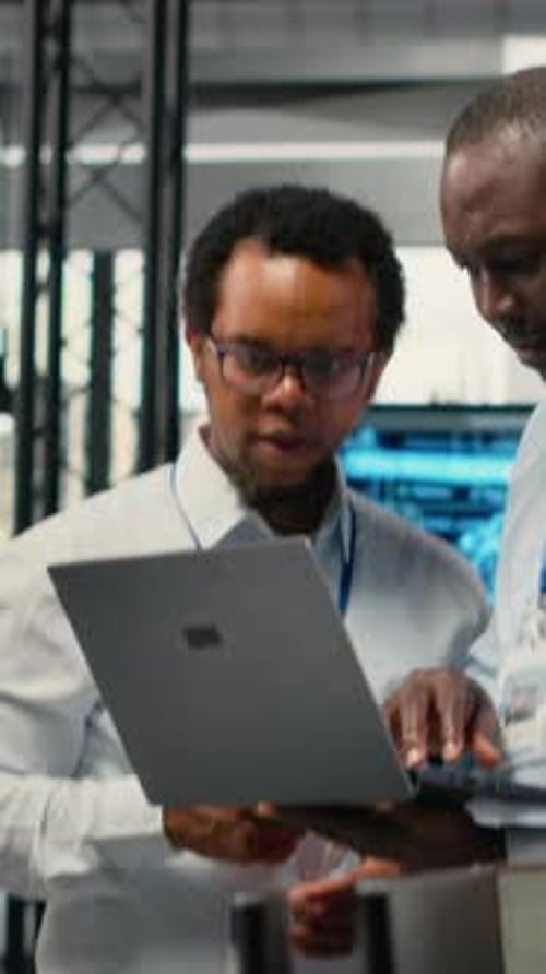 Vertical Video Programmers in Office Doing Software Development Brainstorming