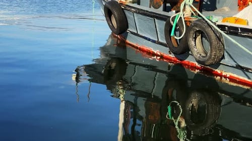 Fishing Boat Reflection On Sea Water 20