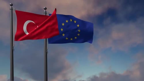 Turkish and European Union Flags Waving Against Cloudy Sky