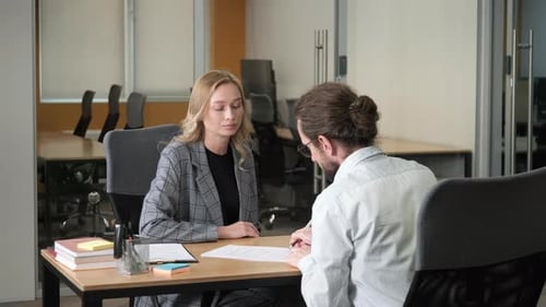 Two Business Person Inside a Modern Office