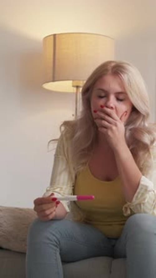 Woman Concerned with Pregnancy Test Results in Home