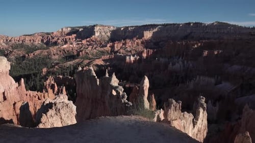 Sunrise point in Bryce Canyon national park Utah with eroded sandstone formations, Aerial dolly in s