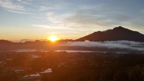 Scenic Sunrise Over Mountainous Landscape Aerial View