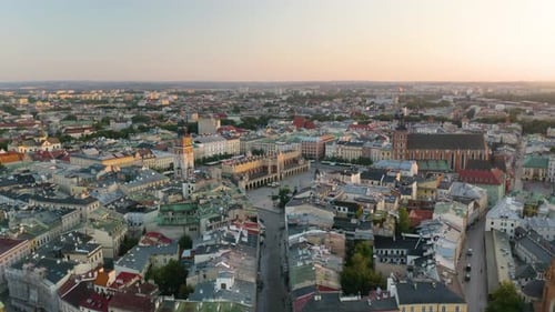 Aerial Pedestal Up Reveals Krakow Old Town during Amazing Sunrise