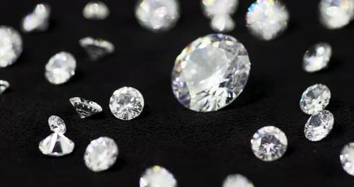 Elegant Diamonds Sparkling on Black Background Close Up