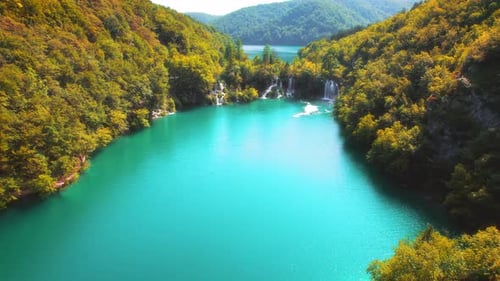 Mountain landscape with waterfalls and lake in autumn forest in Plitvice Lakes National Park Croatia
