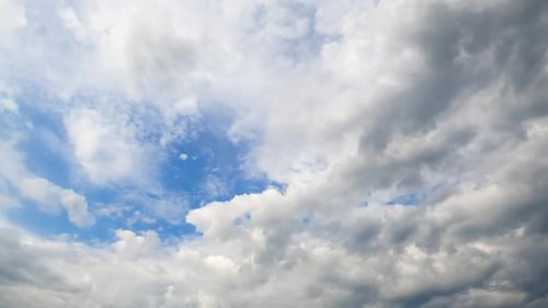 Cumulus cloudscape moving the atmosphere. Sky can't be seen behind the thick clouds.