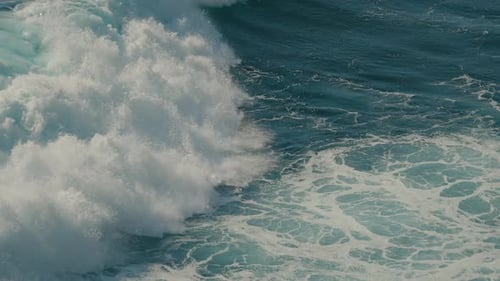 Crashing Ocean Wave Creates White Seafoam