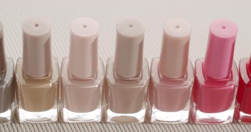 Assortment of Nail Polish Bottles Dolly Shot