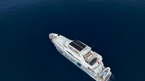 White Yacht Floating Over Endless Ocean Horizon