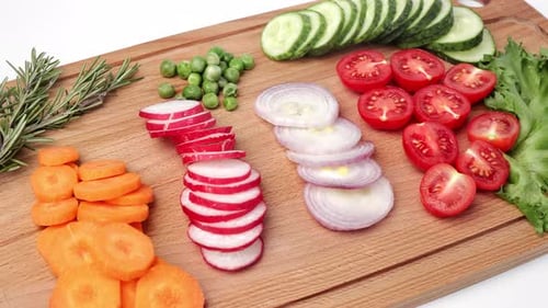 Fresh Cut Vegetables on Wooden Cutting Board