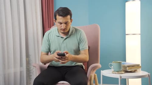 The man arguing in the messaging is angry.