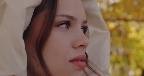 Closeup Face of Woman Looking Around at the Autumn Park Slow Motion