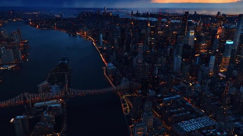 Flight above the magnificent New York, the USA after sunset. Drone footage above the East River