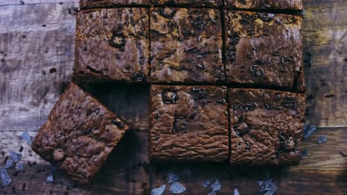 Decadent Chocolate Brownies Overhead on Rustic Wood