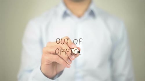 Out of Office, Man Writing on Transparent Screen