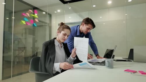 Businessman, corporate woman and laptop for planning, teamwork and strategy in office