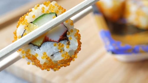 Sushi Roll with Salmon Shrimps and Avocado