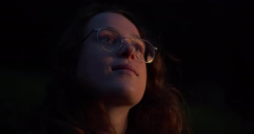 Young Adult Enjoying Sunset in Nature