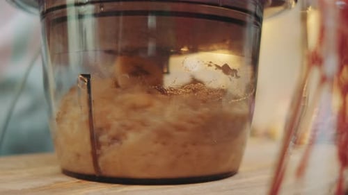 Banana Slices Blended into Smoothie in Kitchen