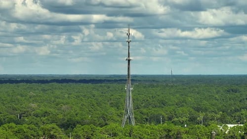 Aerial View of Telecommunications Cell Phone Tower with Wireless Communication 5g Antennas for