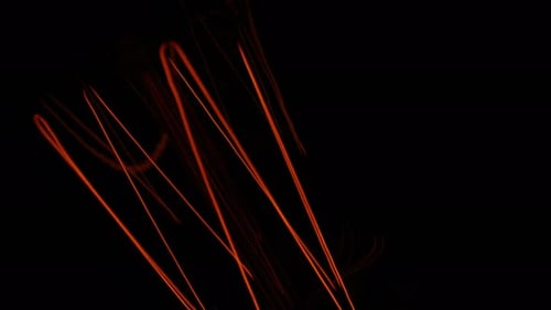 Filaments Glowing Inside Lightbulb on Black