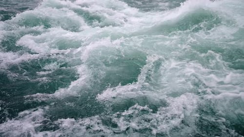 Slow Motion of Wild Clear Mountain River Stream Flowing Through Rocks