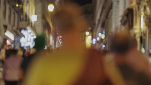 People Walking on European Street at Evening Blurred Footage
